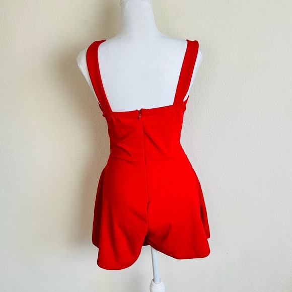 NWOT Red Overlay Asymmetrical Skirt O-Ring Romper - Picture 2 of 9
